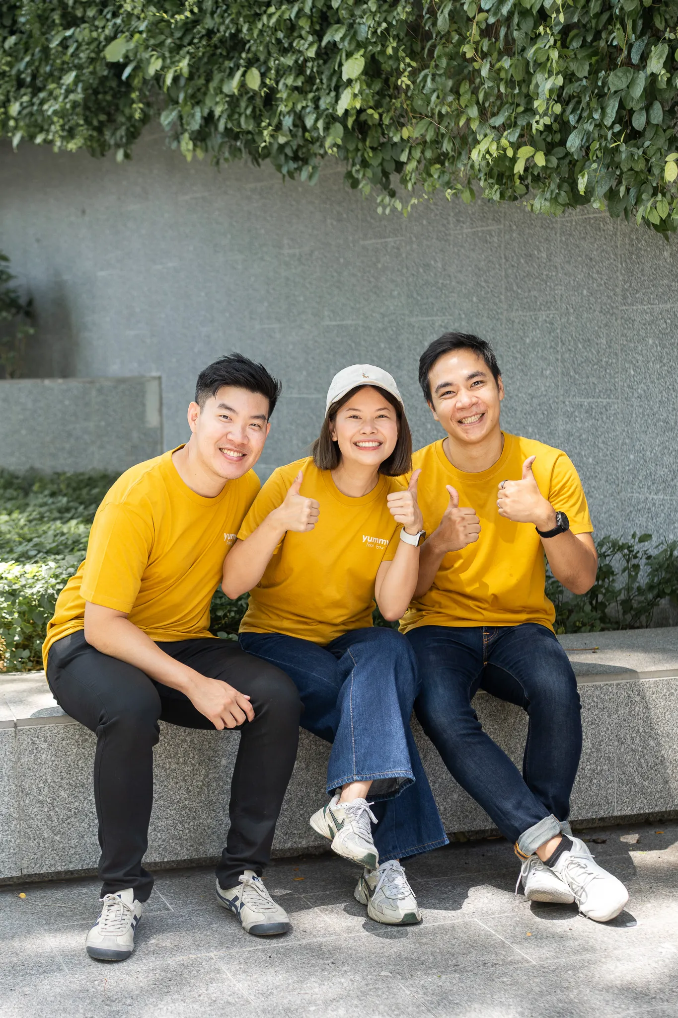 The three Yummy Food Tour founders giving a thumbs up
